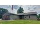 Charming single-story home featuring a brick accented two-car garage and American flag at 600 Old Moore Rd, Martinsville, IN 46151