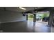 Spacious two car garage with epoxy flooring and new garage doors at 600 Old Moore Rd, Martinsville, IN 46151
