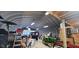View of garage interior with multiple tools, equipment, and ample open space at 600 Old Moore Rd, Martinsville, IN 46151