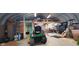 View of garage interior with multiple tools, equipment, mezzanine, and ample workspace at 600 Old Moore Rd, Martinsville, IN 46151