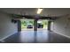 Spacious two car garage with epoxy flooring and new garage doors at 600 Old Moore Rd, Martinsville, IN 46151