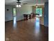 Bright living area featuring hardwood floors and a view of the outdoor deck at 600 Old Moore Rd, Martinsville, IN 46151