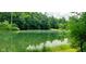 Private waterfront property, complete with a picturesque pond, is the perfect setting for building your dream home at 600 Old Moore Rd, Martinsville, IN 46151