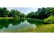 Scenic view of a serene pond surrounded by lush greenery at 600 Old Moore Rd, Martinsville, IN 46151