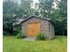 Charming shed exterior with stone facade and double wooden doors at 600 Old Moore Rd, Martinsville, IN 46151