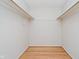 The walk-in closet has wooden floors and metal rails at 6146 Rucker Rd, Indianapolis, IN 46220