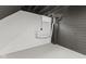 The basement has painted walls and floor, with exposed pipes and a small window at 6477 N Park Ave, Indianapolis, IN 46220
