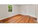 Bedroom showcasing hardwood floors, a window and a closet at 6477 N Park Ave, Indianapolis, IN 46220