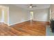 Bright living room with a decorative fireplace, hardwood floors, and an open, airy feel at 6477 N Park Ave, Indianapolis, IN 46220