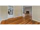 Spacious living room showcasing hardwood floors, a cozy fireplace, and an open layout at 6477 N Park Ave, Indianapolis, IN 46220