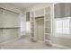 Spacious walk-in closet with ample shelving and hanging space for organized storage at 6685 Chapel Xing, Zionsville, IN 46077