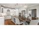 Spacious kitchen featuring a central island, stainless steel appliances, and white cabinetry at 6685 Chapel Xing, Zionsville, IN 46077