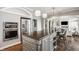 Modern kitchen featuring stainless steel appliances, an island, and ample counter space at 6685 Chapel Xing, Zionsville, IN 46077