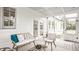 Relaxing screened porch with wicker furniture, pillows, and serene outdoor ambiance at 6685 Chapel Xing, Zionsville, IN 46077
