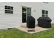 Backyard with siding, a patio, and two grills with covers, perfect for outdoor entertaining at 6927 Rose Tree Ct, Indianapolis, IN 46237