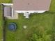 Aerial view of the backyard showing a trampoline, shed, firepit, and patio at 6927 Rose Tree Ct, Indianapolis, IN 46237