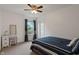 Cozy bedroom with a window seat, white trim, and neutral colored walls at 6927 Rose Tree Ct, Indianapolis, IN 46237