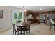 Eat-in kitchen features stainless steel appliances, wood cabinets and access to the backyard at 6927 Rose Tree Ct, Indianapolis, IN 46237