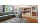 Spacious living room connected to the kitchen and dining area, perfect for entertaining at 6927 Rose Tree Ct, Indianapolis, IN 46237