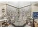Walk-in shower with tile surround, and built-in bench at 7025 Chimney Rock Ct, Indianapolis, IN 46217