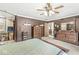The bedroom with two dressers is fully carpeted and well-lit at 7025 Chimney Rock Ct, Indianapolis, IN 46217