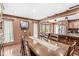 Dining room adjoining open kitchen with hardwood floors at 7025 Chimney Rock Ct, Indianapolis, IN 46217
