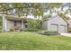 Attractive home with a two-car garage, well-manicured lawn, tasteful landscaping, and inviting curb appeal at 7025 Chimney Rock Ct, Indianapolis, IN 46217