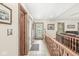 Light-filled hallway with tile floors and a decorative glass front door at 7025 Chimney Rock Ct, Indianapolis, IN 46217