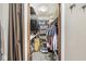 Spacious walk-in closet featuring built-in shelving and ample storage space for clothing and accessories at 7025 Chimney Rock Ct, Indianapolis, IN 46217