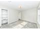 Spacious bedroom with a large closet and one window offering ample natural light at 713 W Cromer Ave, Muncie, IN 47303