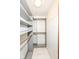 A spacious closet with a flush mount light and organized shelving at 713 W Cromer Ave, Muncie, IN 47303