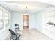 Dining room featuring a large window, and view of the kitchen at 713 W Cromer Ave, Muncie, IN 47303