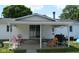 Backyard featuring a covered patio space, grill, seating, and yard at 719 Henry St, Lebanon, IN 46052