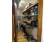 Walk-in pantry features stocked shelving and a wood floor at 719 Henry St, Lebanon, IN 46052