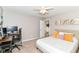 Inviting bedroom boasting a comfortable bed, convenient desk space, and soothing neutral tones at 7214 Morello Ln, Noblesville, IN 46062
