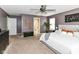Cozy bedroom with neutral carpet, ceiling fan, ample natural light, and a stylish decor at 7214 Morello Ln, Noblesville, IN 46062
