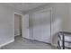Bright bedroom offering closet space and convenient access to other areas of the home at 724 Alexander St, Greenwood, IN 46143
