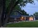 Exterior view of the home with brick and siding, a covered porch, and a well-kept lawn at 75 Byram Blvd, Martinsville, IN 46151
