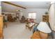 Open living space with comfortable seating, dining area, and lots of natural light at 7632 Sea Crest N Way, Noblesville, IN 46062