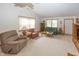 Spacious living area with neutral carpet and furnishings, great natural light at 7632 Sea Crest N Way, Noblesville, IN 46062