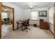 Bright office with natural light, desk, chair, and file cabinet at 7632 Sea Crest N Way, Noblesville, IN 46062