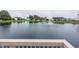Picturesque pond featuring a fountain, surrounded by well-maintained landscaping and trees at 7632 Sea Crest N Way, Noblesville, IN 46062
