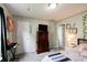 Comfortable bedroom featuring a dresser, keyboard, decorations, and a cozy atmosphere at 8148 Gathering Cir, Indianapolis, IN 46259
