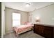 Charming bedroom with a twin bed, dresser, and cozy decor at 8148 Gathering Cir, Indianapolis, IN 46259