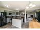 Well-equipped kitchen with stainless steel appliances and an adjacent open-concept dining area at 8148 Gathering Cir, Indianapolis, IN 46259
