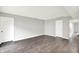 Basement with luxury vinyl floors, white doors, neutral paint and a large open floorplan at 8545 La Corrida Ct, Indianapolis, IN 46227