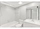 Clean and bright bathroom with tub and shower combination and modern vanity at 8545 La Corrida Ct, Indianapolis, IN 46227