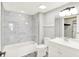 Bathroom featuring stylish marble tile shower and white vanity at 8545 La Corrida Ct, Indianapolis, IN 46227