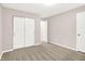 Bedroom featuring carpeting and double doors leading to a closet at 8720 Yardley Ct # 108, Indianapolis, IN 46268