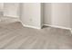 Hallway with neutral carpeting, white baseboards, and access to other rooms at 8720 Yardley Ct # 108, Indianapolis, IN 46268